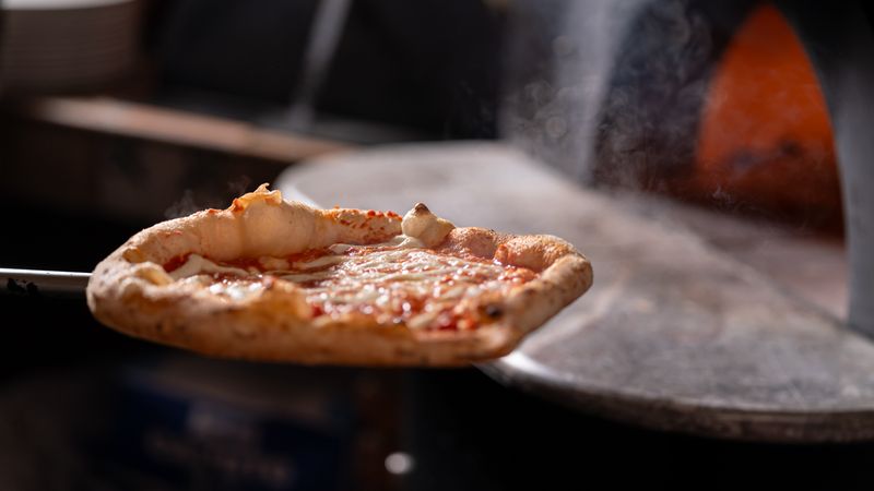 Four cheese pizza at pizza factory