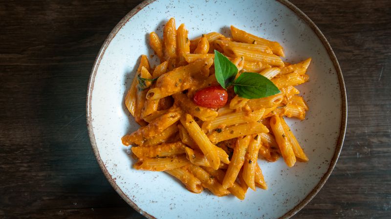 Penne Arrabbiata spicy pasta at pizza factory