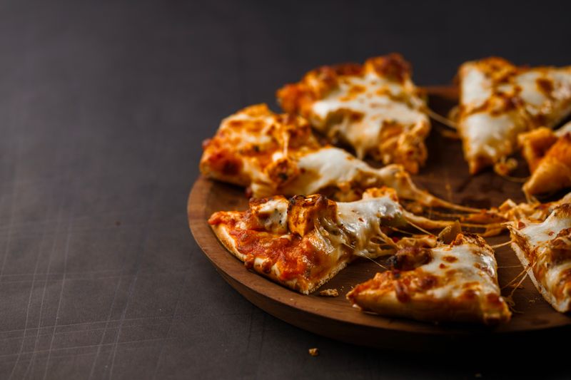 Pepperoni pizza loaded with toppings at pizza factory